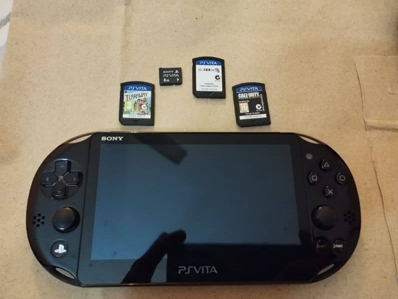 Sony PS VITA with 3 Games 1