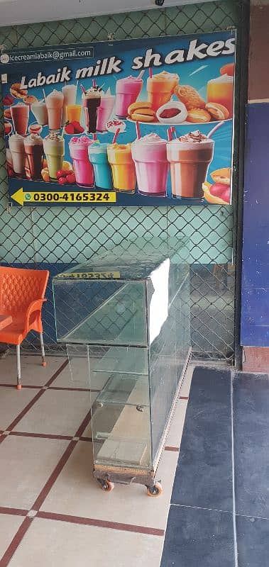 Glass Counter for sale  with iron stand & wheel 6