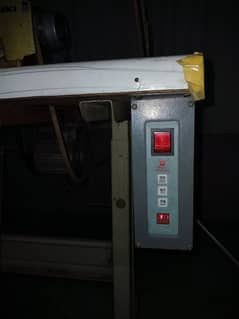 Over-lock Safety Machine With Table and Motar.