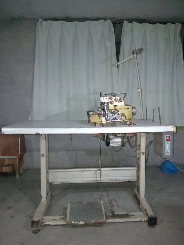 Over-lock Safety Machine With Table and Motar. 1