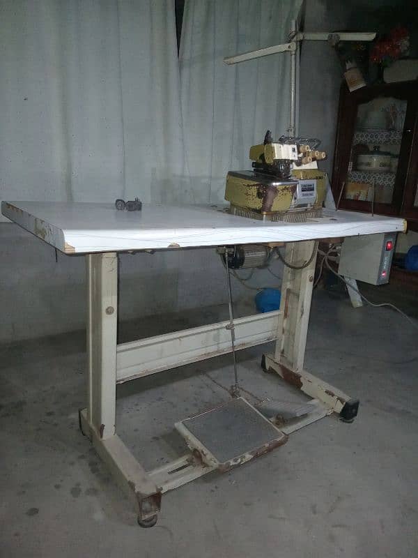 Over-lock Safety Machine With Table and Motar. 8