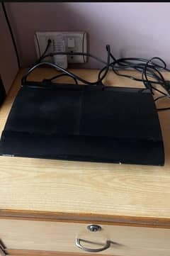 PS3 console with 4 to 6 CD's