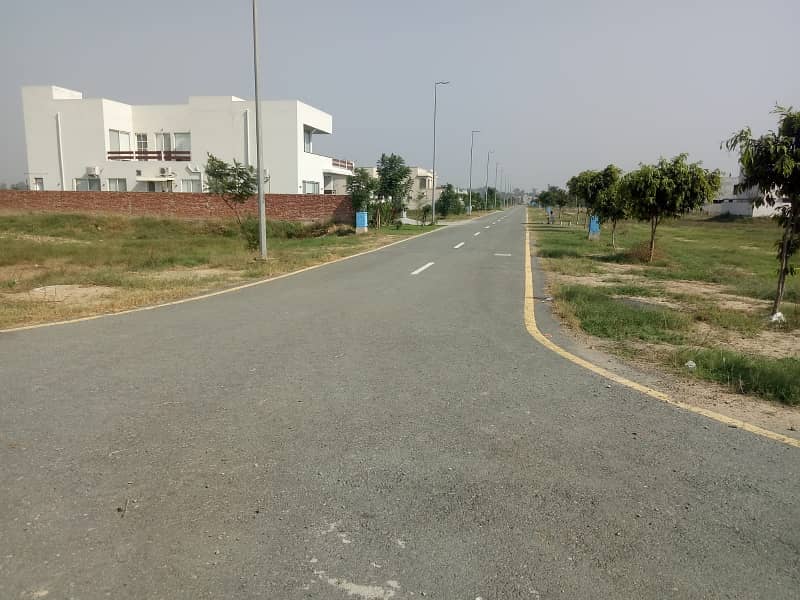 9 MARLA PLOT IN DHA PHASE 4 BLOCK KK FOR SALE MEETING POSSIBLE 2