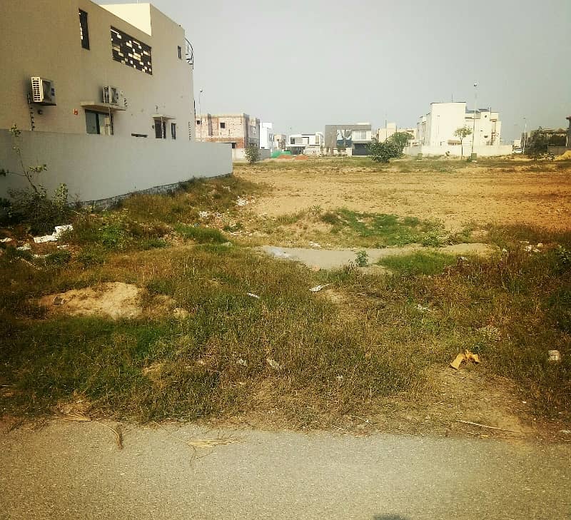 9 MARLA PLOT IN DHA PHASE 4 BLOCK KK FOR SALE MEETING POSSIBLE 3