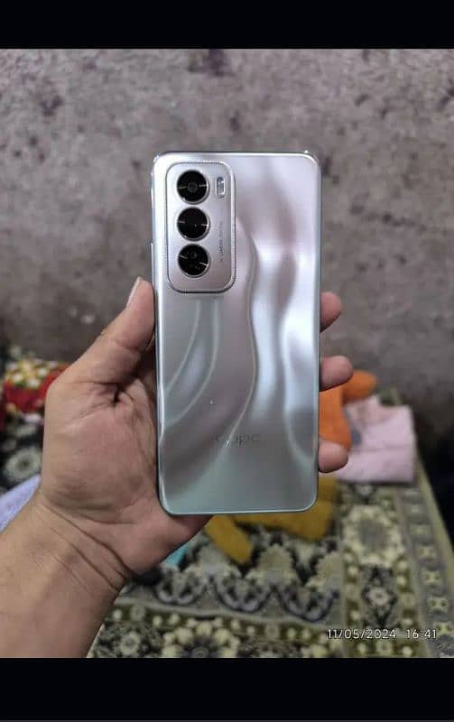 oppo Reno 12 in brand new condition only 1-2 months used with all acce 0