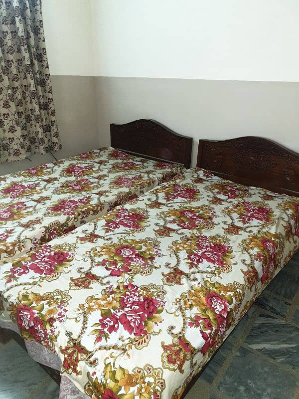 2 single bed with metres 1