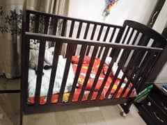 wooden cot/ crib