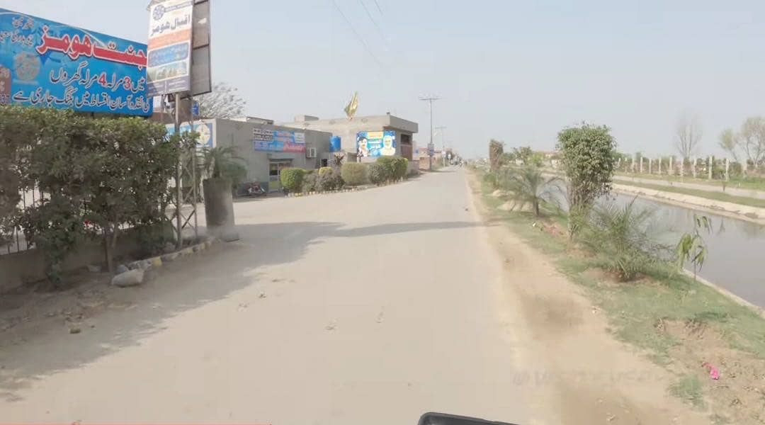 5 MARLA PLOT READY POSSESSION SURROUNDING HOUSES AVAILABLE FOR IN AL JANNAT HOUSING KAHNA 9