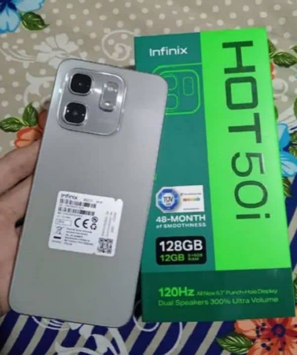 28 days use full wrnty infinx hot 50i 12Gb ram 6+6  128 storeg camra 1