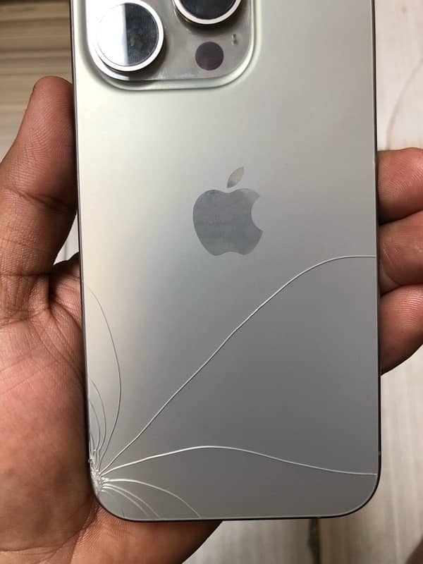 iphone 15 pro 128 non pra 2 months sim time back glass minor crack 7