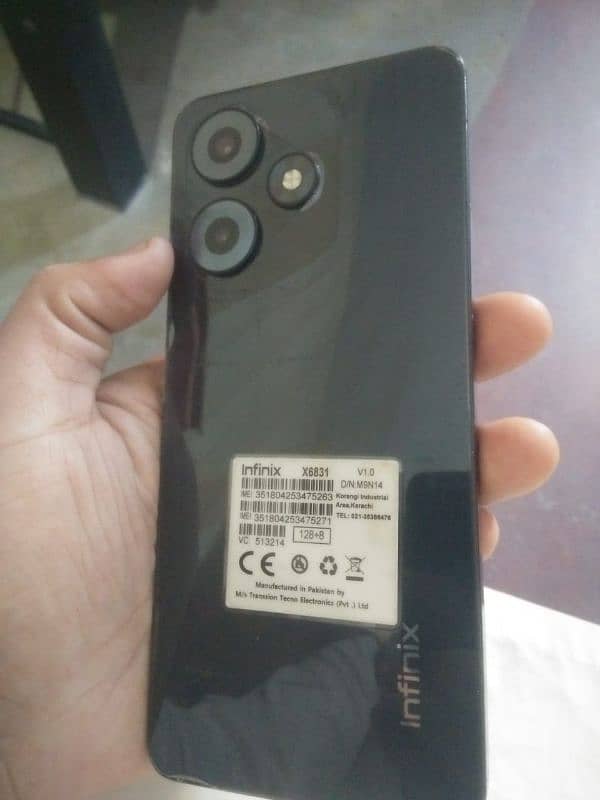 Infinix hot 30 10/10 condition no hang good phone with charge and boks 0