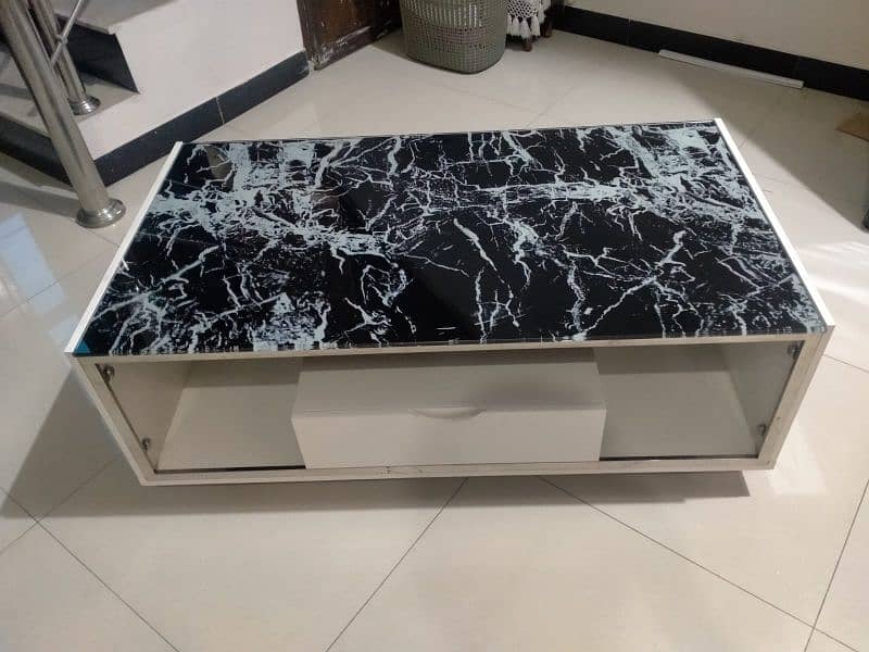 Coffee Table With a Black Marble-patterned Glass Top 2