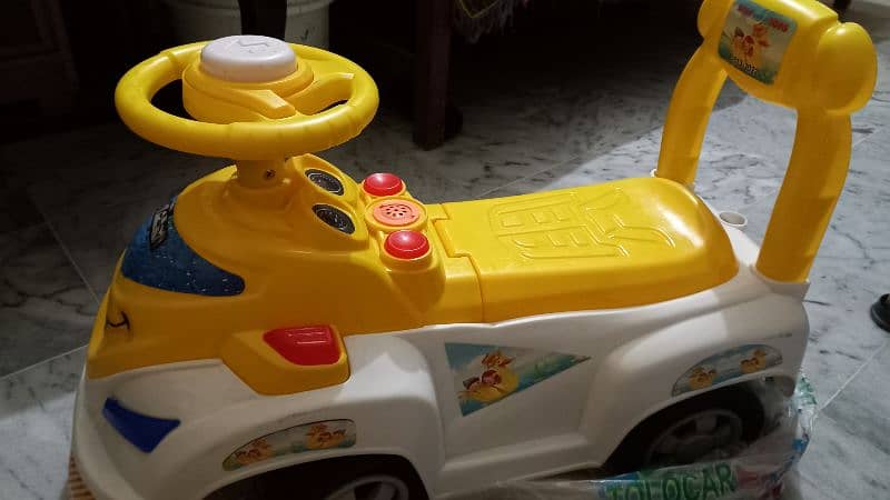 Kids' Ride-On Car - Fun and Safe Play 2