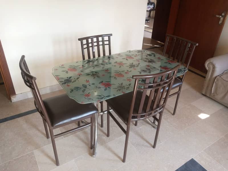 wrought iron dining table with 4 chairs 0