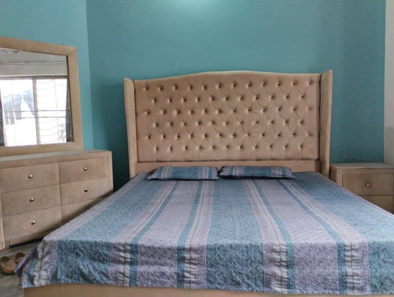 double bed with side tables and dressing 0