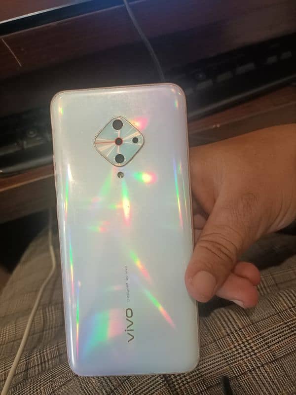 5/10 condition Vivo S1 pro only phone purple spot on display 1