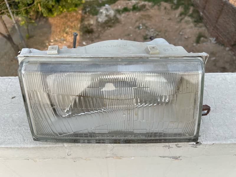 Toyota Corolla 1986 Genuine Headlight Right Side only 0