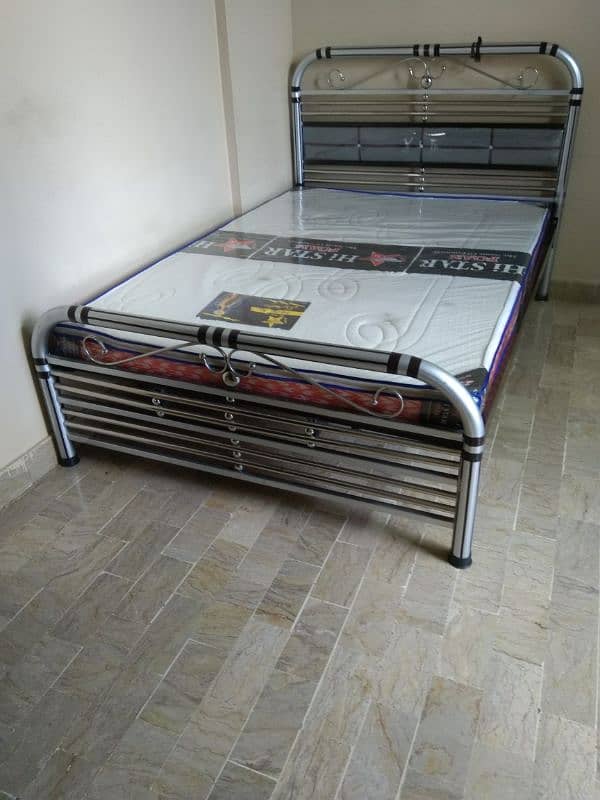 iron bed with metres 4 by 6 1