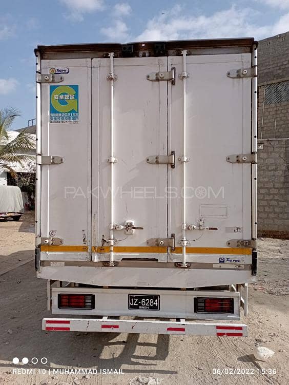 Isuzu NKR 14 FIT With AC container 9