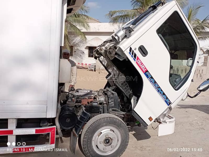 Isuzu NKR 14 FIT With AC container 11