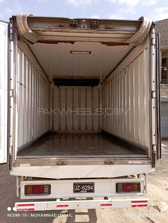 Isuzu NKR 14 FIT With AC container 18