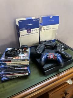 PS4 Slim with 4 controllers and 7 Cd’s.