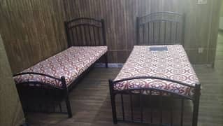 Iron single beds in very good condition for sale