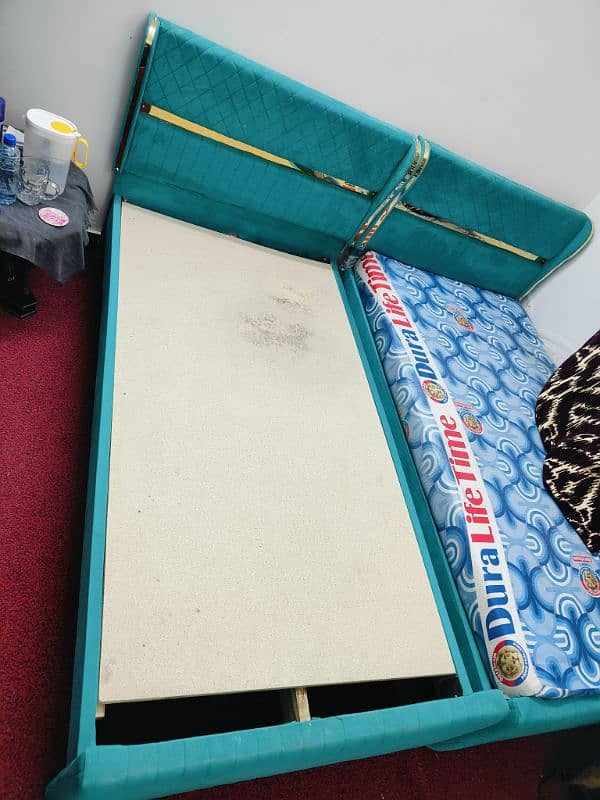 Two wooden beds with mattress foam 2