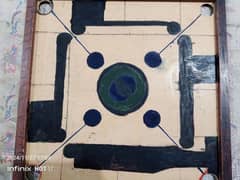 vary good carrom board with coins and strikers,good quality,sports