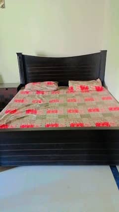 bed with side tables with mattress