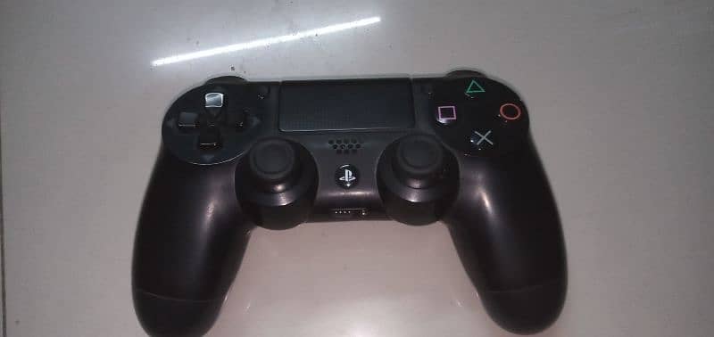 PS4 game console with remote 0