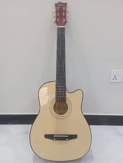 Acoustic guitar with accessories