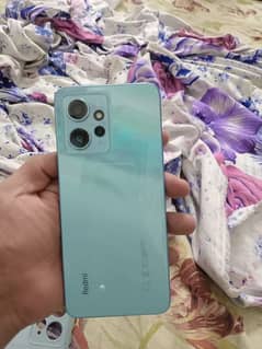 selling redmi note 12 with all accessories