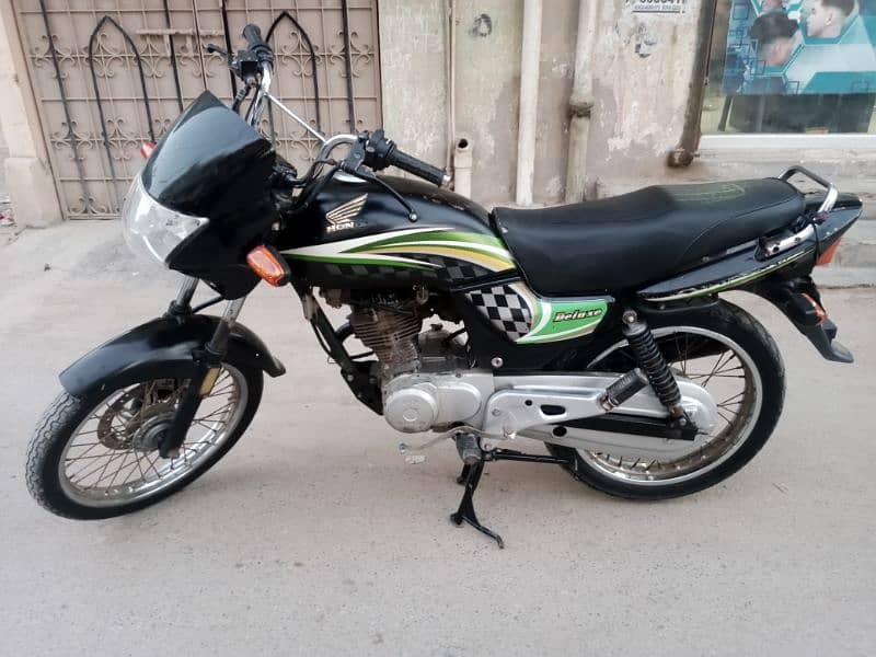 HONDA DELUXE 125CC 2015 MODEL HAYDERABAD NUMBER 11