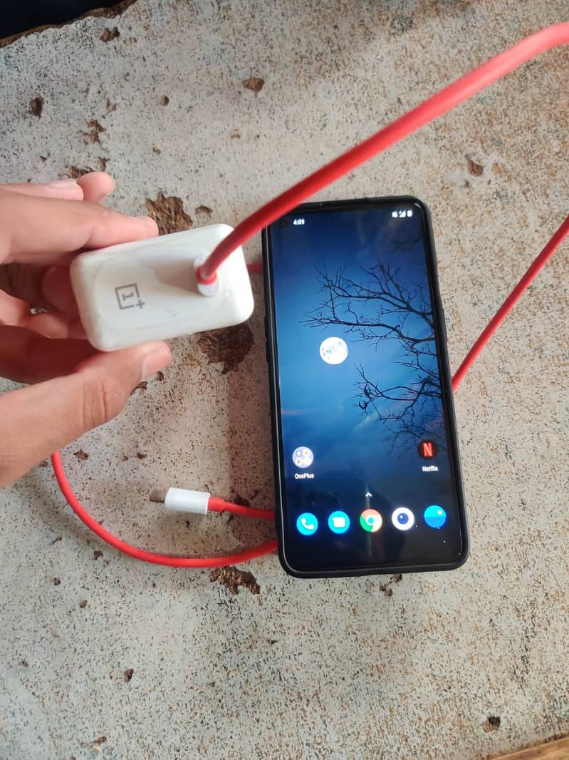 OnePlus 9 with charger 4