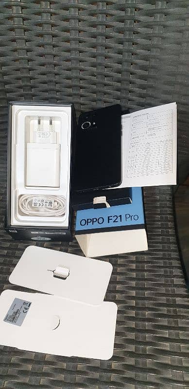 Oppo f21 pro fresh condition with original charger,and data cable,box 0