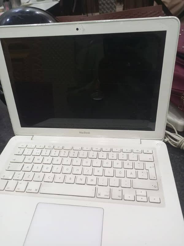 MacBook  pro for sale geniun charger 1