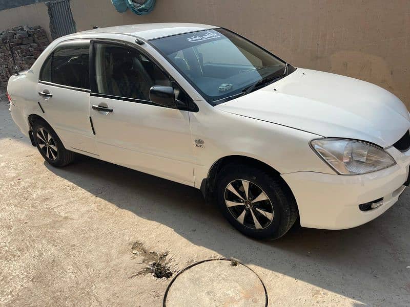 Mitsubishi Lancer 2005 Model Lahore Registered Chilled AC Perfect Fam 5