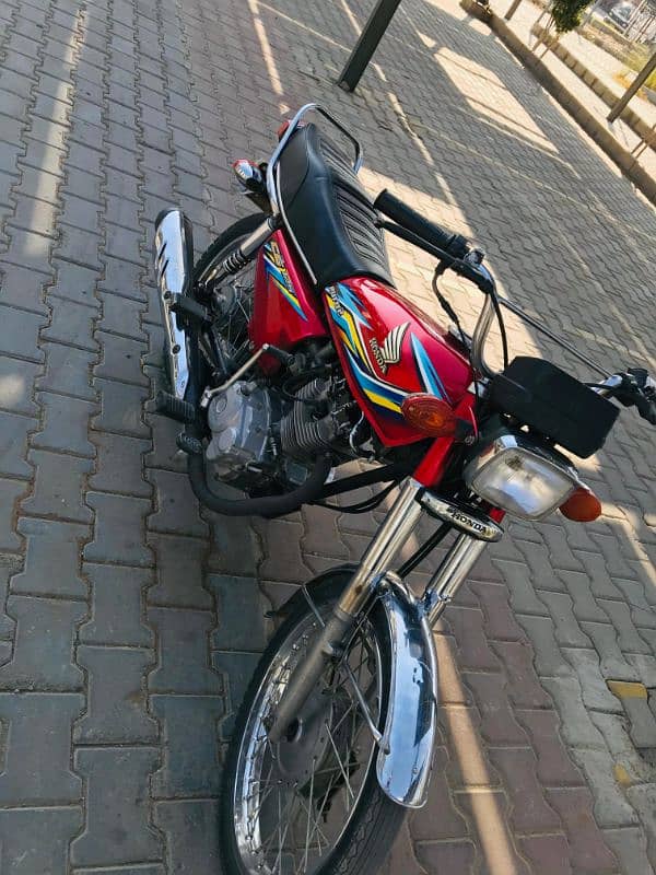 HONDA 125 RED COLOUR PINDI NNBR 0