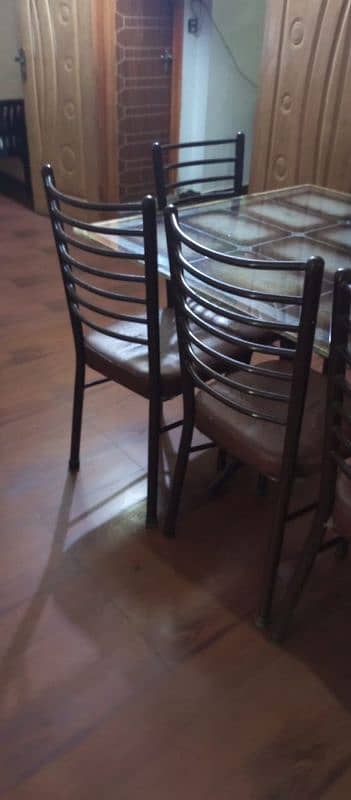 glass dining table iron stand with 10 iron chairs 1