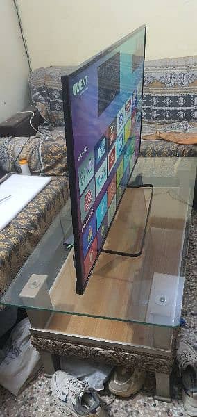 orient 50 inches ultra slim led with android box table stand 0