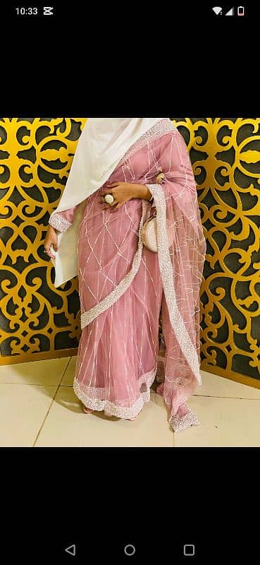 Beautiful Pink Saree Embellished with Pearls and Stones 0