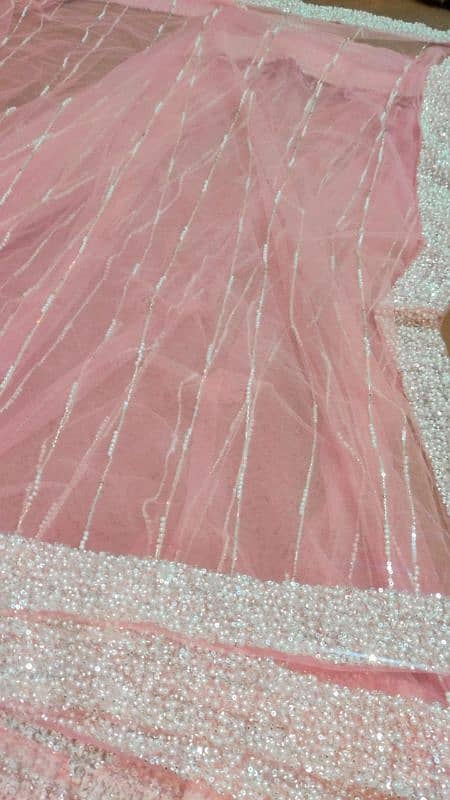 Beautiful Pink Saree Embellished with Pearls and Stones 2