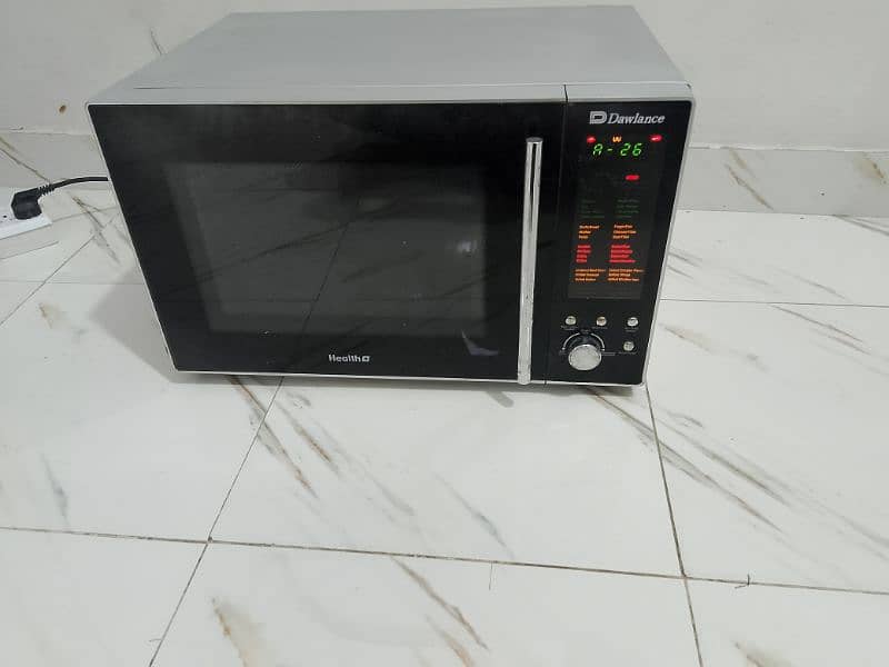 Dawlance 2 in 1 grill microwave oven use new condition large 3