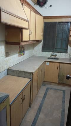 Lower portion for rent 1bad attach bathroom TV launch drawing room kitchen marble flooring wood wark