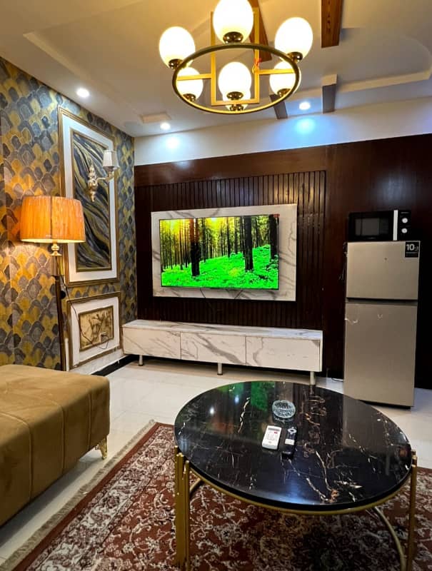 1 Bedroom VIP Full furnish flat per day available in Bahria town Lahore 9