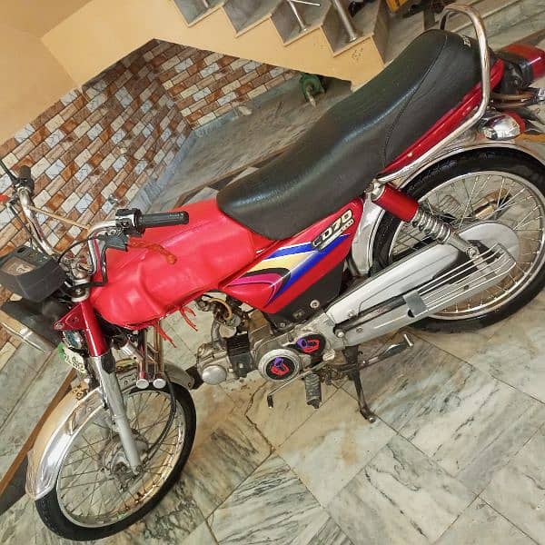 Honda CD 70  red color model 2010 4