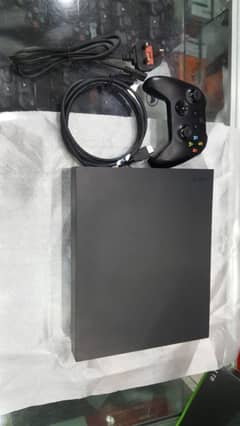 Xbox one x with 2 controllers and 14 day free game pass