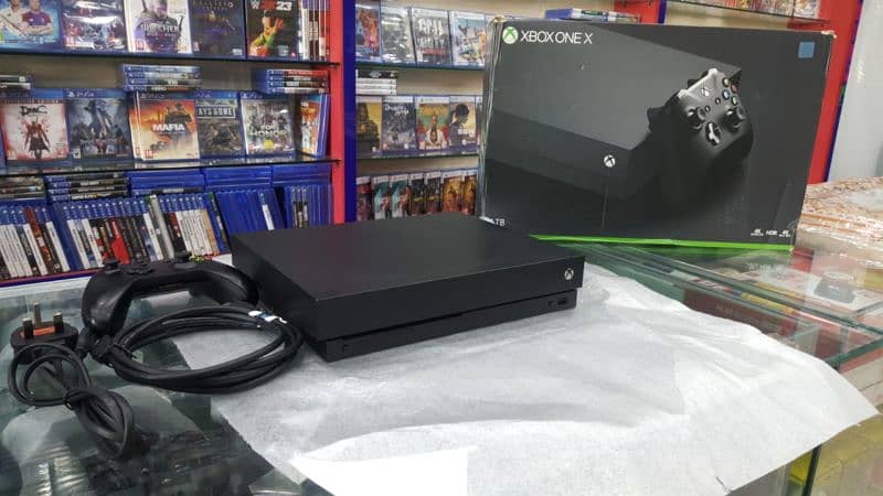 Xbox one x with 2 controllers and 14 day free game pass 2