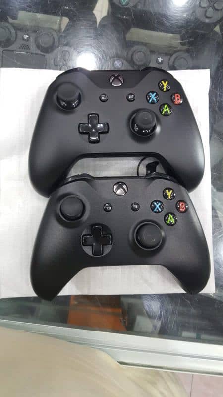 Xbox one x with 2 controllers and 14 day free game pass 3